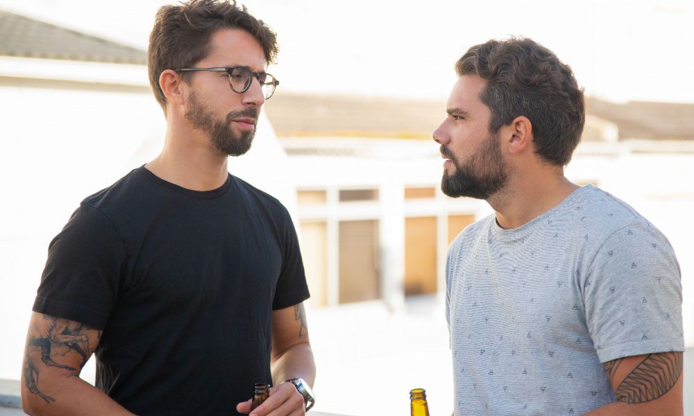 Brothers in law talking over a beer