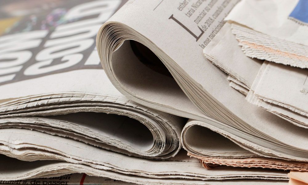 Folded newspapers