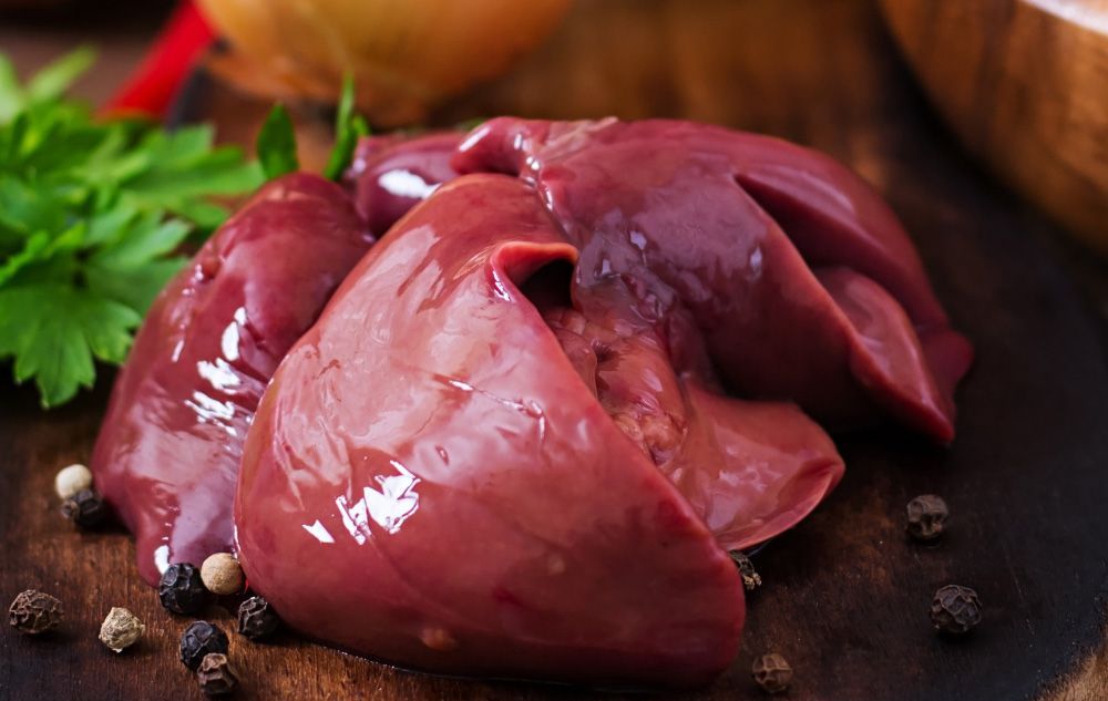 Raw chicken liver for cooking with onions and peppers