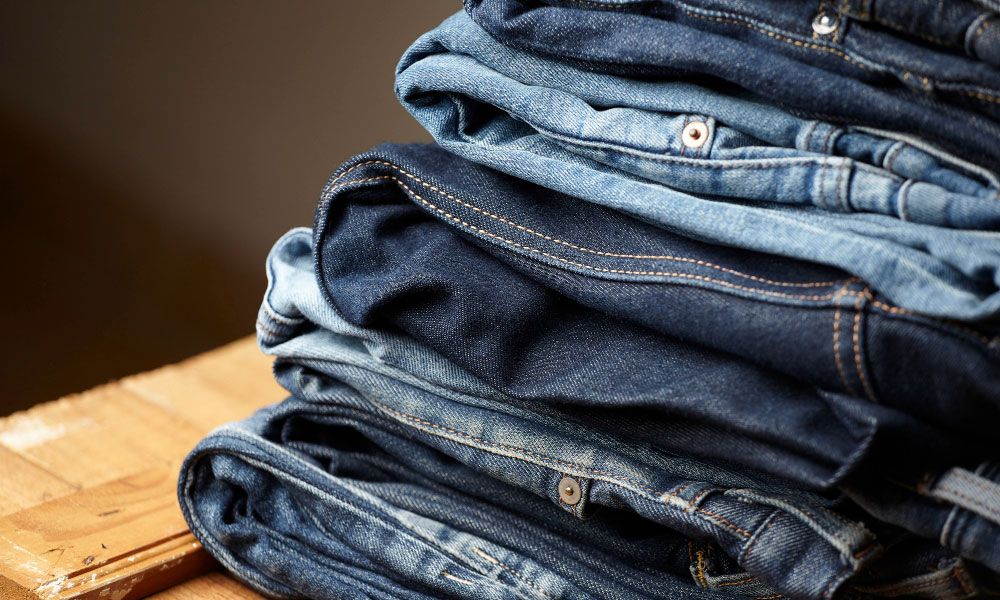 Stack of blue jeans
