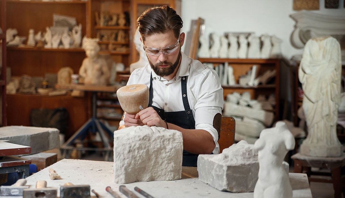 Stonemason working on a sculpture