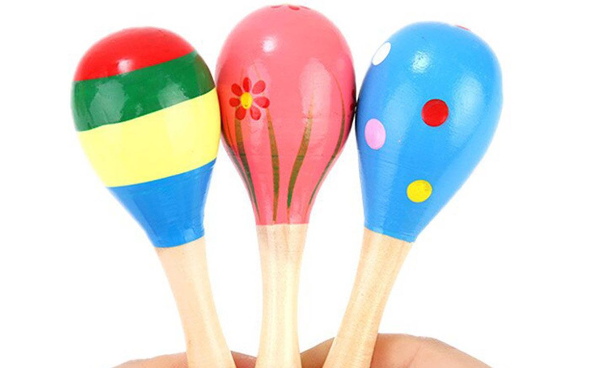 Three wooden colored rattles