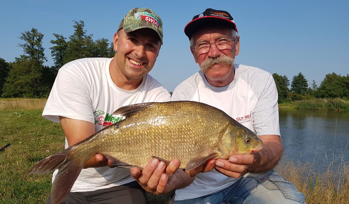 Two anglers with a huge bream